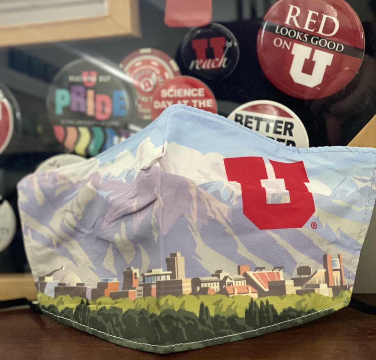 UUtah's tweet image. It’s back by popular demand! 

We gave away these U landscape masks in the spring, and they were such a hit we made some more.

If you want an iconic #UofU campus scene for your face mask repertoire (perhaps for fall break travels) retweet this and we’ll send one out.