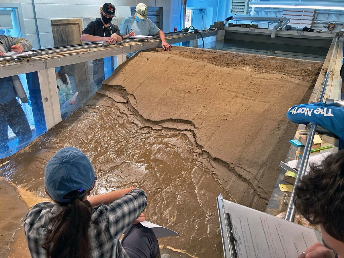 epchamberlin's tweet photo. Happy #flumefriday! We made some fun rotational slides via groundwater sapping yesterday in the Bucknell flume during #geomorph lab. Then we made some sheetflow fans with a hose and had a lucky "house" that wouldn't collapse... fun times in the science sandbox. https://t.co/1ruEJ9PFma