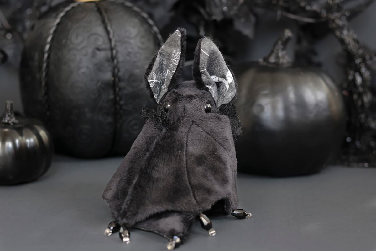 Day 1 of the Sew Scary Halloween event!⁠
⁠
If you've always wanted to wander around a haunted castle wearing all black, this might be the bat for you. Each one is made with soft minky fabric and has a ruff of lace around their neck paired with a silver bat charm.