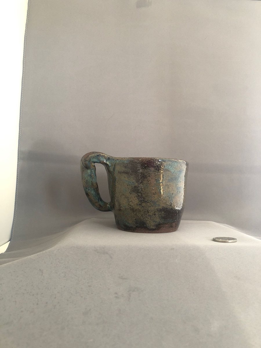 Pottery_lab's tweet photo. Excited to share this item from my #etsy shop: Embolden-Bohemian, Variegated Blue Green Sandstone Mug, Bright Orange inside, Wavy Twisted handle, holds 9.5Oz– Made by Blind Ceramic Artist #whimsical https://t.co/LxKX6hLRum https://t.co/MnPuzFGKft