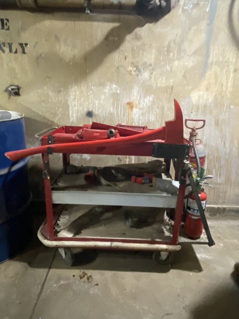 Decommissioned fire cart that was used by a fire brigade in a historic high-rise building back in the early 1900s #whenmenweremen