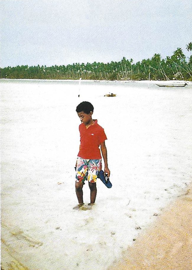 10-year-old Kanye on the beach in Thailand (1987)