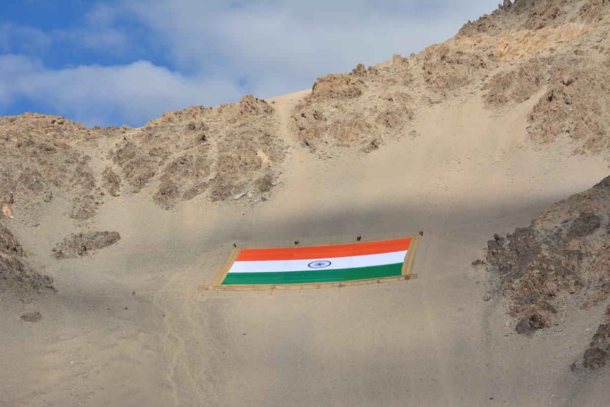 ChairmanKvic's tweet photo. Proud to share the unveiling of World's largest Monumnetal National Flag made of Khadi,today at Leh by Hon’ble LG Ladakh Shri RK Mathur ji.The Flag is made by KVIC &amp; displayed by the Indian Army. The flag symbolizes India's vastness &amp; creativity of Khadi artisans 
@PMOIndia https://t.co/v0s4CdWd4K