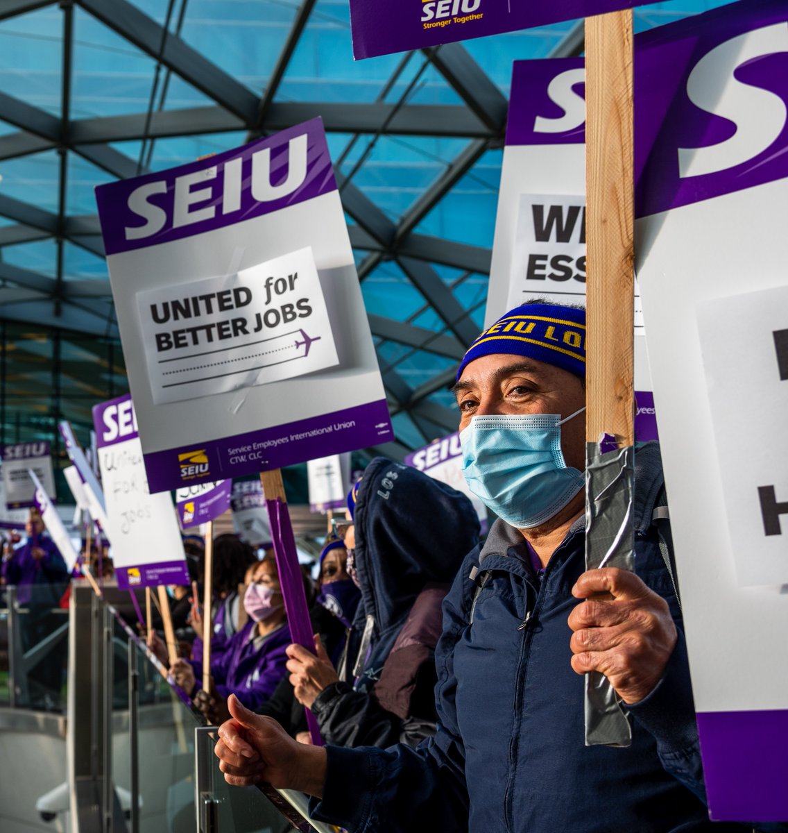 SEIU105's tweet photo. #DIAJanitorsStrike sent a strong message, we are essential and it’s time that we’re paid like it. As we return to work today and continue negotiations, our message remains clear: respect us, protect us, and pay us. We're more united than ever to win!✊🏿✊🏽✊🏼 https://t.co/SqRjFK7U6f