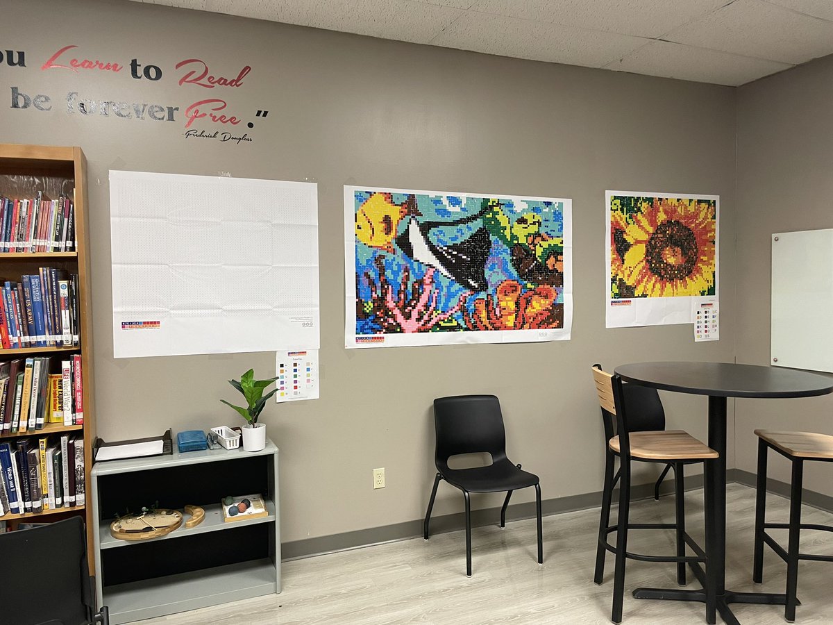 annamvandelft's tweet photo. Our back wall is filling up nicely in the @KCR1SCHOOLS high school/middle school library! They’re just too pretty to take down! @byStickTogether https://t.co/xWSgp0jl9q