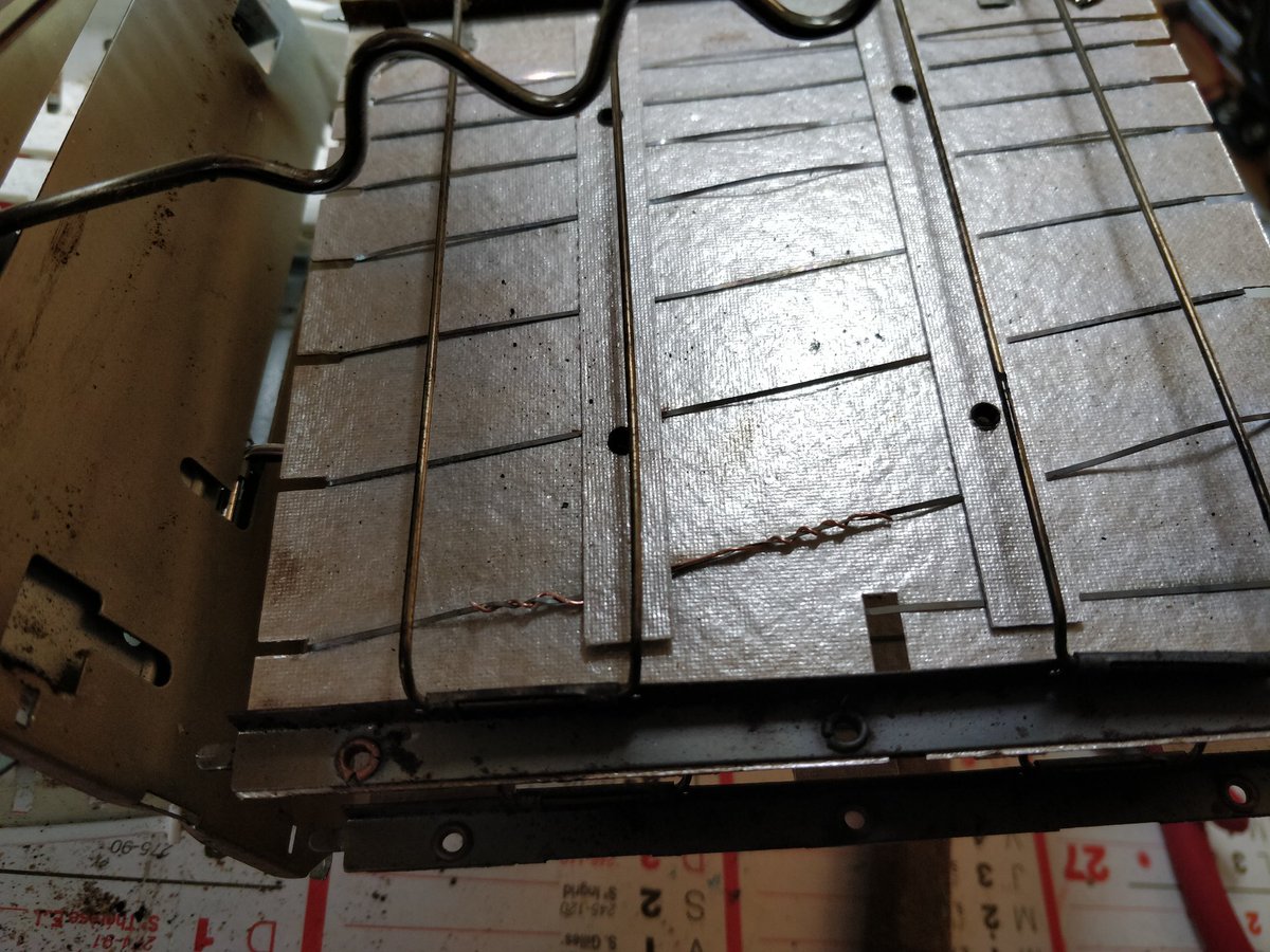bluxte's tweet photo. I'm part of a "repair café" where people bring their broken devices and we (try to) repair them and teach their owner. I brought some homework with this toaster whose heating resistor was cut. One hour of work and 5 cm of wire and it's back on track! Don't trash things, fix them! https://t.co/eOWoAc6X8D