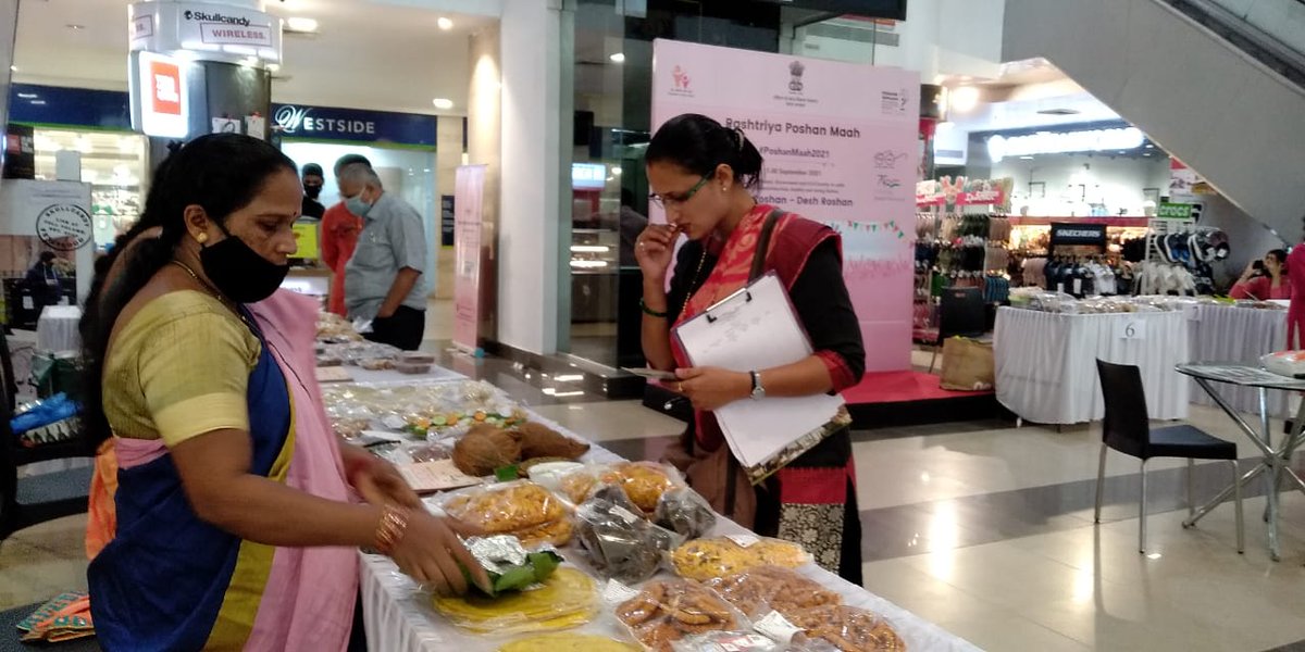 CBC_Goa's tweet photo. Smt Geeta Velingker of Krishi Vigyan Kendra, South Goa, visits the stalls of @FOB_Goa's Poshan Food Festival to assess the entries of Poshan Food Competition on Day 3 at #CaculoMall, Panaji, #Goa. #PoshanAbhiyan @robmhgoa @GoaScience https://t.co/UDtHjGsa08