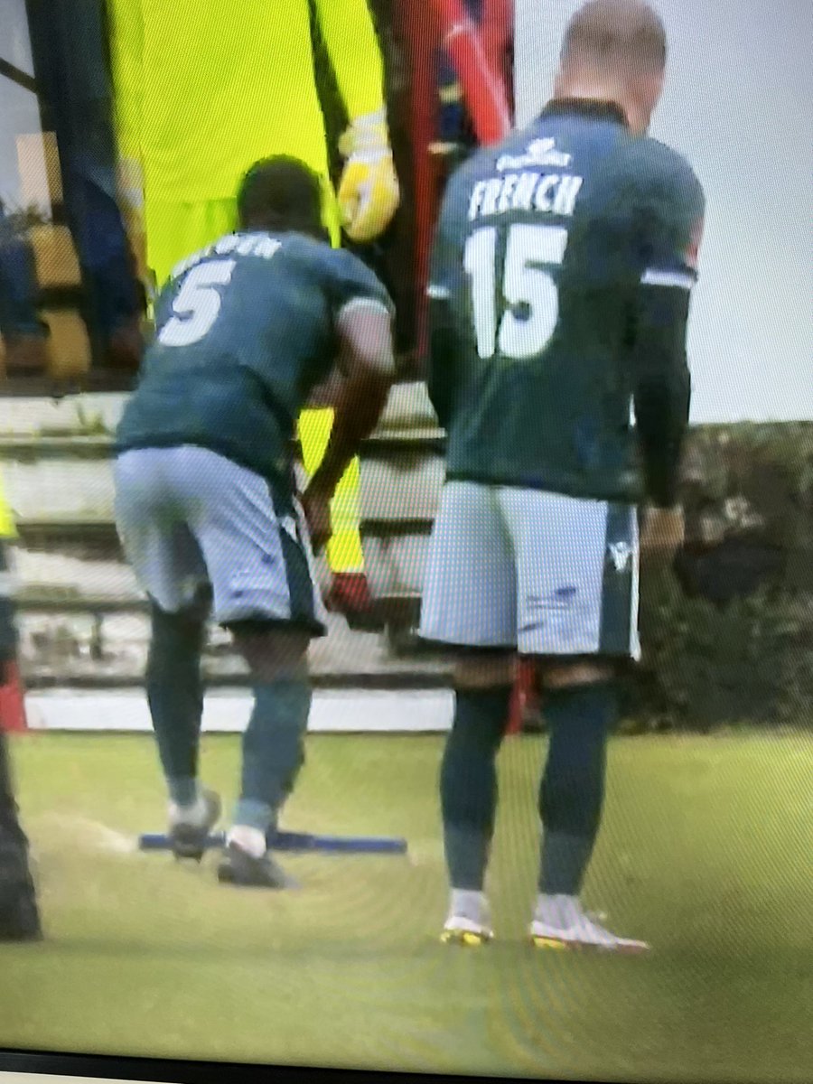 RMcElhenney's tweet photo. I’m watching our PLAYERS MOP THE FIELD to continue the game. I’ve never seen anything like it. Official statement from the Co-chairman: “We need to get out of this fucking league.” @Wrexham_AFC https://t.co/c0R6PADYKu