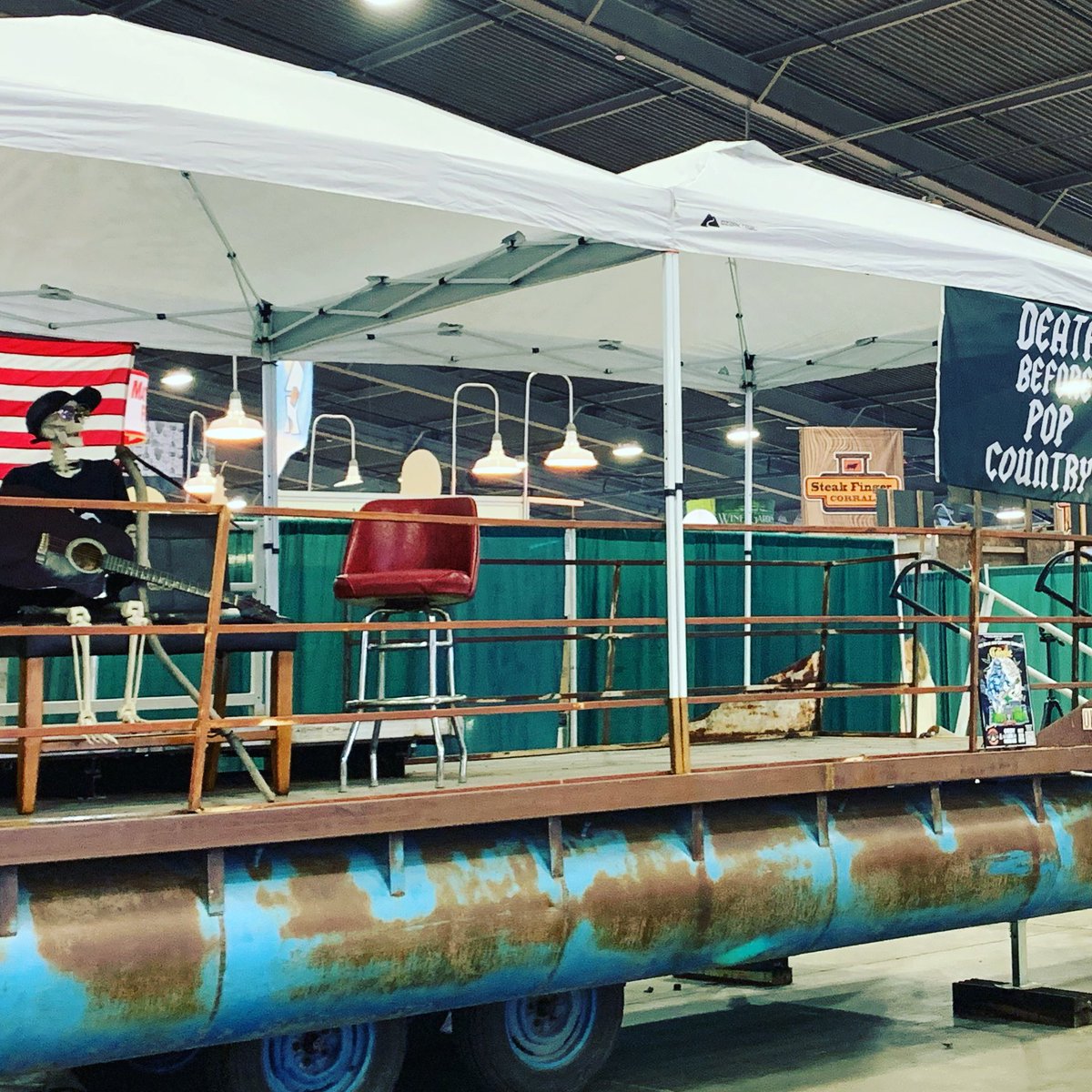 PopBefore's tweet photo. Bobby Bonehead is waiting for his friends Allison Nicole, Matt Thompson, and Dakota Murillo to join him on stage today for some pickin on the Death Before Pop Country stage located on the upper level of the Expo Building by the food court .#dbpc
#deathbeforepopcountry https://t.co/QoIdWGCoIk