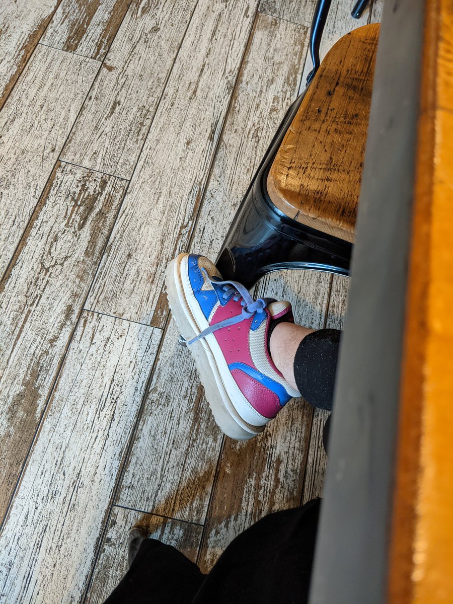 yourgrantaire's tweet photo. Having a very nice day and stopped for lunch. As I'm sitting here, a child (?) walked by and said "I like your bisexual-colored shoes". I'm having a great day. https://t.co/vVceUG7SEW