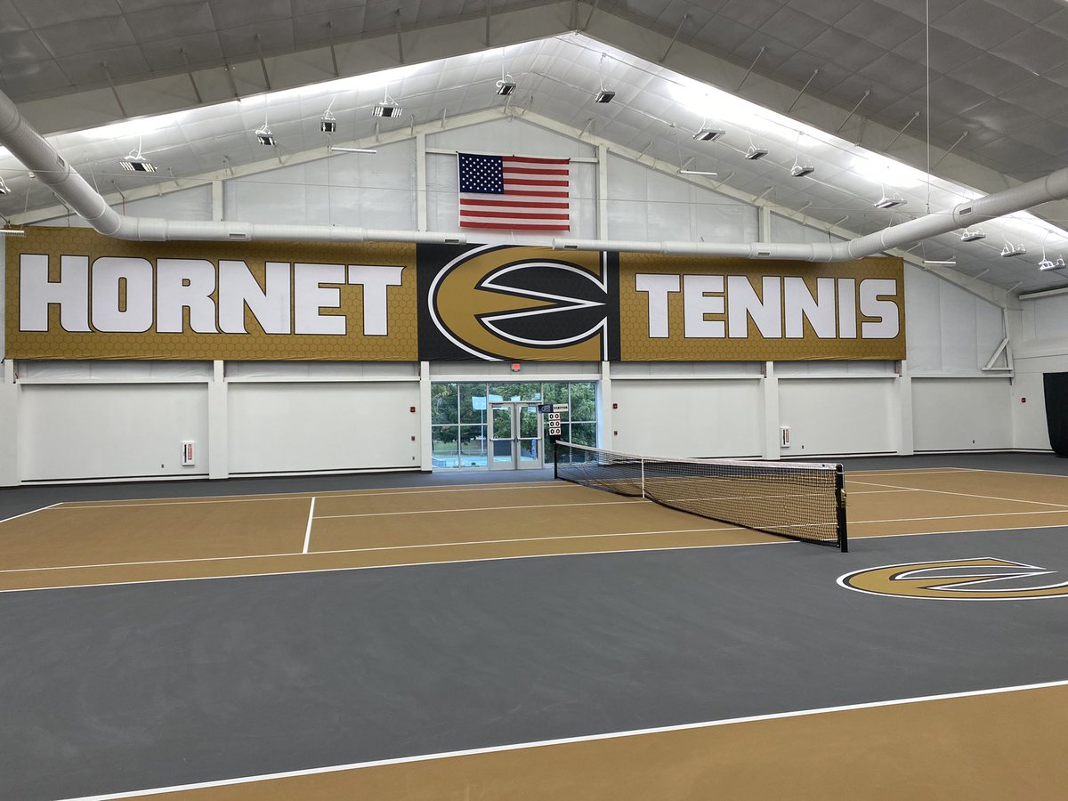emporiastate's tweet photo. The ribbon has been cut ✂️ 
for the Kossover Family Tennis Complex! We are so excited for this addition to campus 🎾💛. Thank you to everyone
who made this possible! #StingersUp https://t.co/hIBW6N9pU3