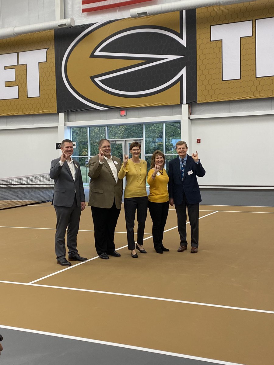 emporiastate's tweet photo. The ribbon has been cut ✂️ 
for the Kossover Family Tennis Complex! We are so excited for this addition to campus 🎾💛. Thank you to everyone
who made this possible! #StingersUp https://t.co/hIBW6N9pU3