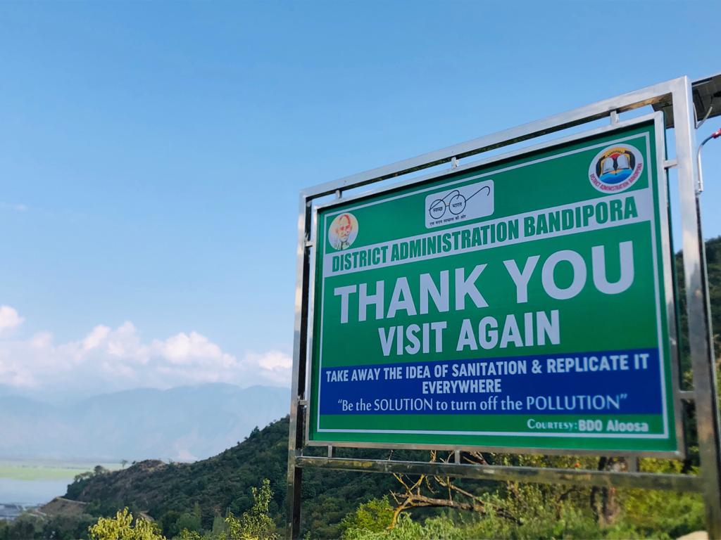 AloosaBlock's tweet photo. As a run-up to "Clean India Programme", besides other activities, the  Beautification of Sopore-Bandipora Road started today by installation of Retro-reflective Sign boards bearing Sanitation/Swachhta slogans. @swachhbharat @dcbandipora @dicbandipora @owais_ias @KashmirRdd https://t.co/XN2D1WcFd1