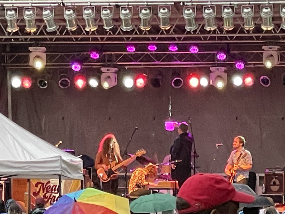 Having a good time at <a href="/ParksFest/">ParksFest Music Festival</a> despite someone on stage needing to hold a bucket to protect the bands from the rain. Always a fun event in town each year.