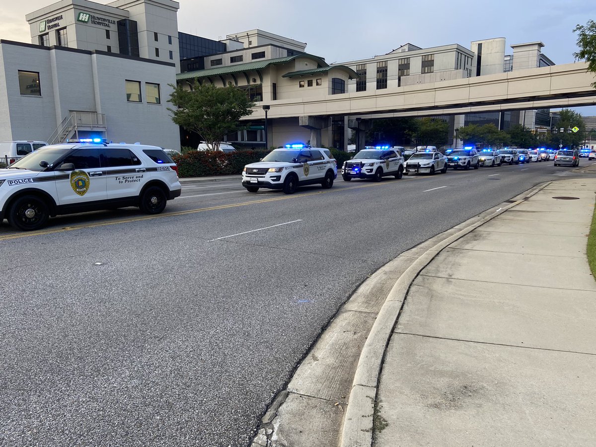 BrekenLaughlin's tweet photo. Huntsville police and other LEOs escorting fallen officer Sgt. Nick Risner to UAB. He is donating his organs to save more people. #Hero #SheffieldPD https://t.co/YQcw7xBuJo