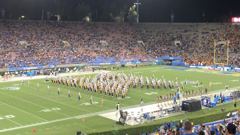 yoongipiphany's tweet photo. bruin and army pride! went to UCLA’s football game solely for the marching band to play #DYNAMITE #BUTTER and #ON during the half-time show 💜they even organized into the bts logo as well as ‘BTS’ and ‘ARMY’ 🥺 https://t.co/odoEjnsOET