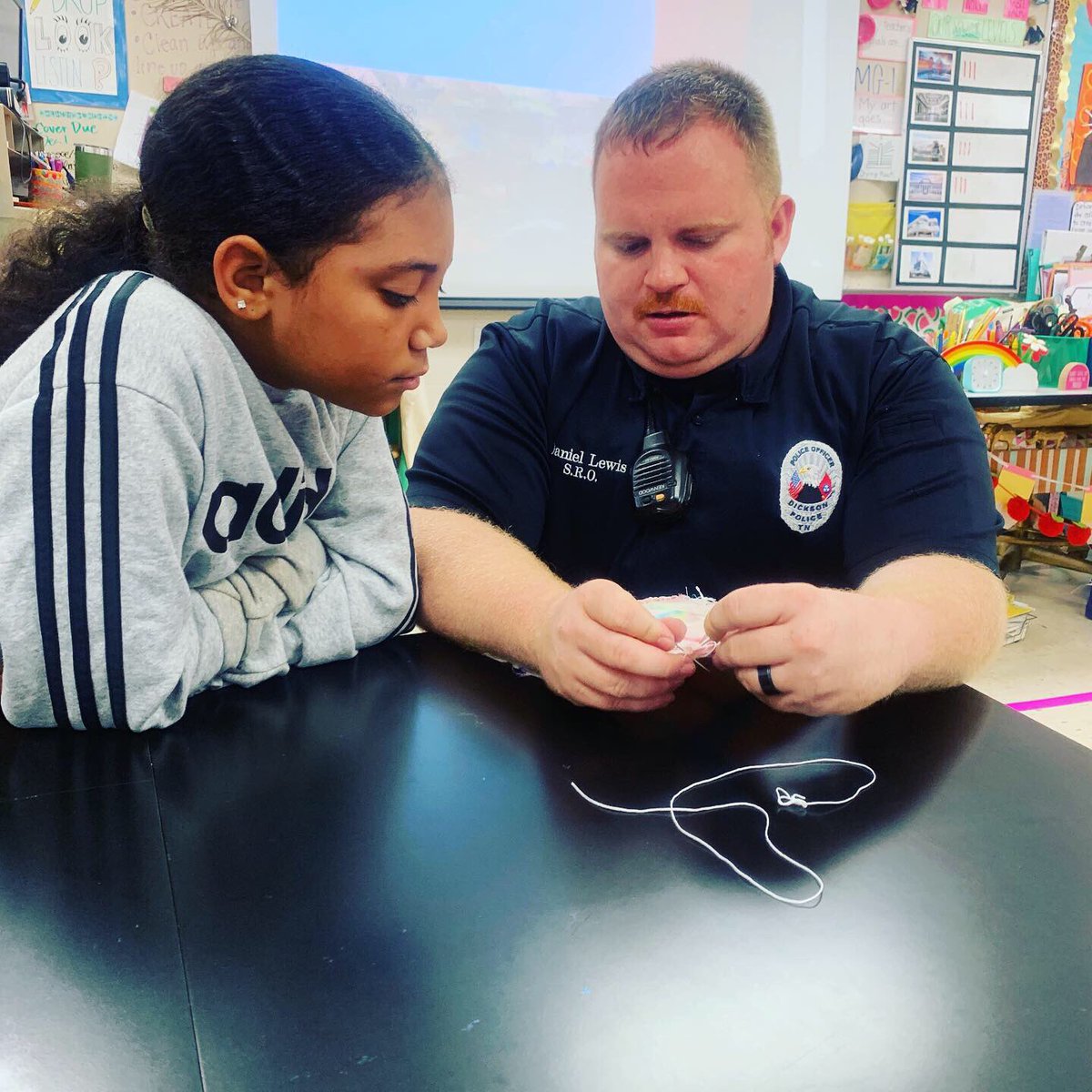 teachcentart's tweet image. We had a guest artist in the art room last week: our favorite SRO, Officer Lewis! He showed off his sewing skills and taught us all a few things! #teachcent #teachcentart #magicmakers