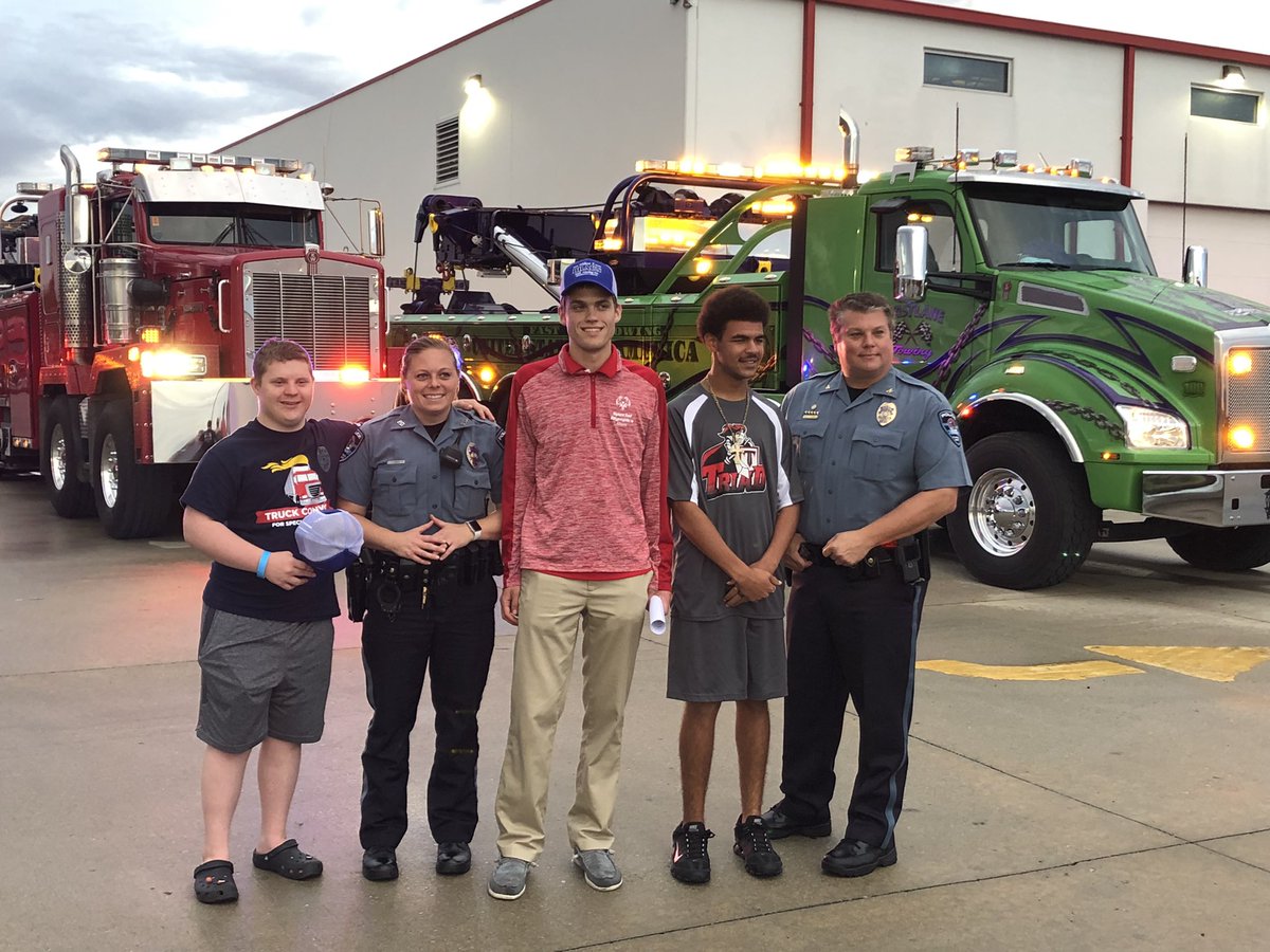 SO_Illinois's tweet photo. The #IllinoisTruckConvoy was back on the road this evening in #TroyIL. Thank you to all who participated and helped support #SpecialOlympicsIllinois athletes 🚛 🚔 @IllinoisLETR @troypolice @cittrucks @iltrucking #midwesttruckersassociation https://t.co/2yKBYFtWr8
