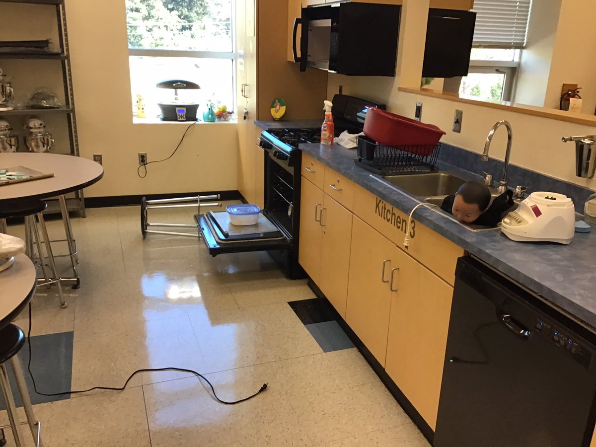 Our kitchen “crime scene.” Students were asked to find at least 20 kitchen safety mistakes. They are now creating presentations, using their detective skills and their immeasurable creativity, to solve the mystery of what happened to the gingerbread person. <a href="/APSKenmore/">Kenmore MS</a> #FACS