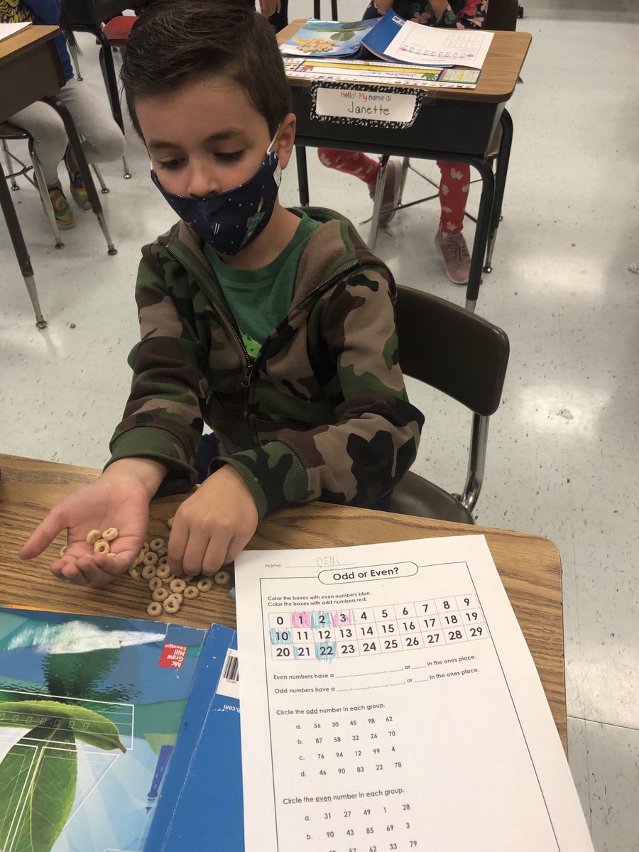 Class 2A eating their math class work-as they discover even and odd numbers of Cheerios!