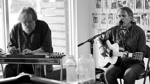 Stop by and hang out with us until 2pm today! John Rauhouse &amp; Norm Pratt are stopping by to perform some tunes from 11am-2pm.