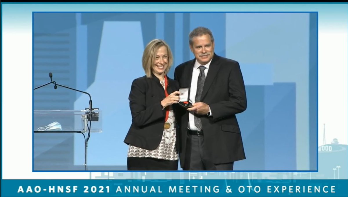 DrNwando's tweet photo. In a lovely moment of reflection, @DeanBradfordMD from @OSUWexMed @OhioStateMed gives the @AAOHNS Presidential citation to her husband, Engr. David Bradford who has been an essential rock for her and a supporter of her leadership rise since medical school. #HeForShe https://t.co/BAXH7TTHdj