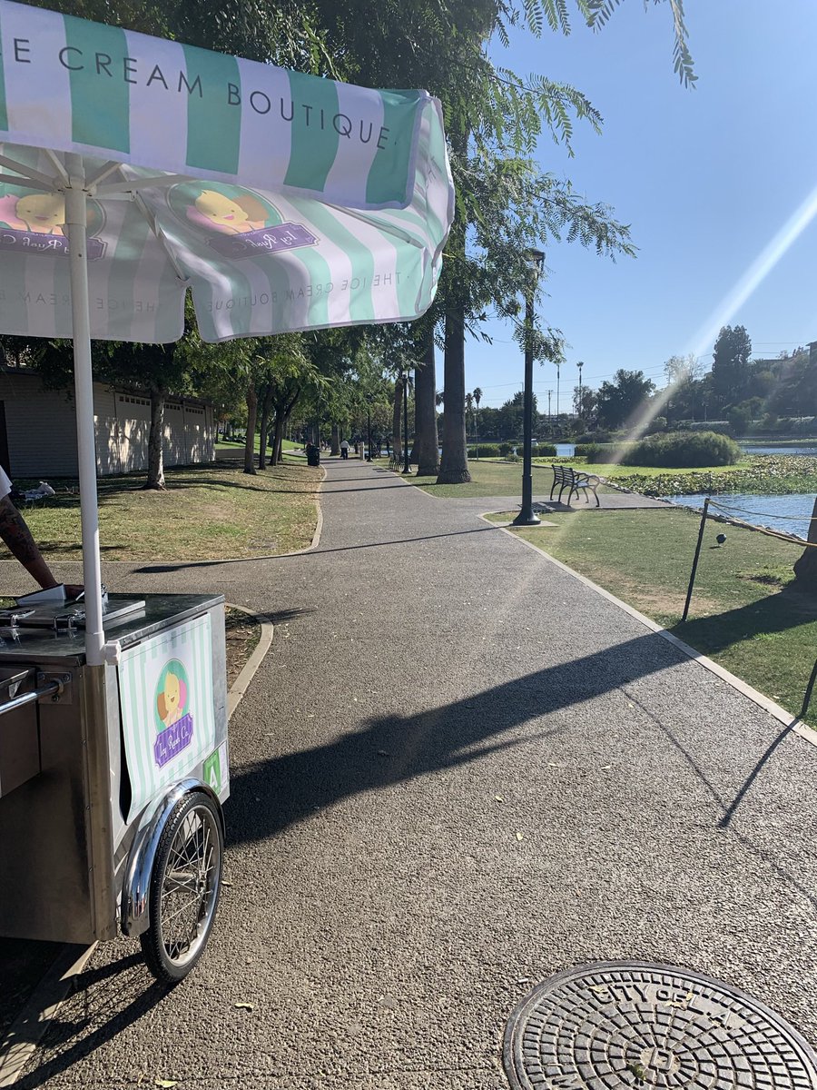 shaylarmyers's tweet photo. Echo Park, six months after the eviction, in two pictures:  ice cream boutique inside the park, respados and paletas outside the fence. https://t.co/MznqMnlhcJ