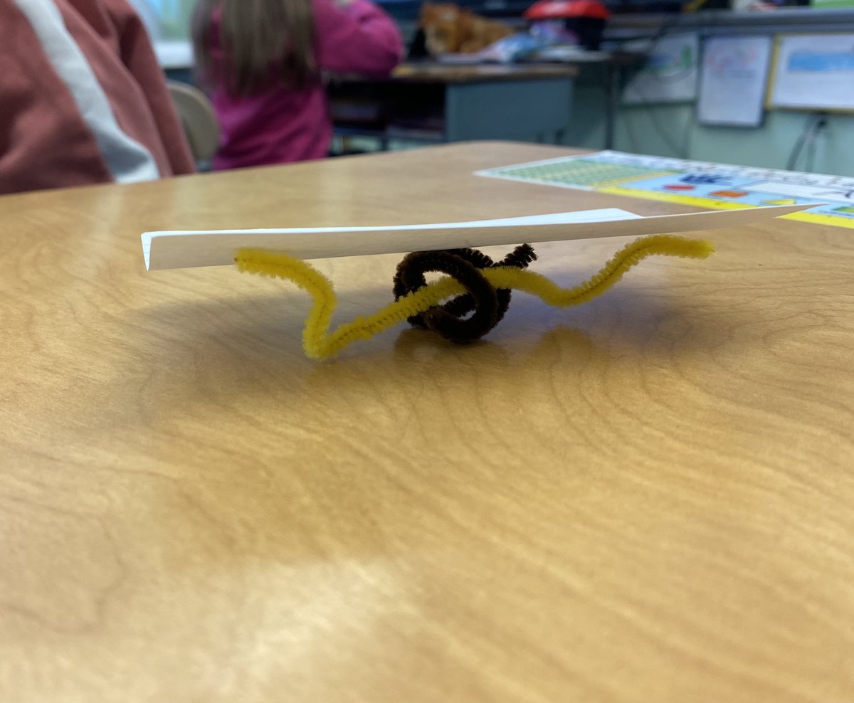 1st graders in STEAM were given this task: just using three pipe cleaners and nothing else, can you make your index card balance off of your desk? I am so impressed by the creativity and perseverance shown by these learners!! 🤩 #STEAM #growthmindset #weareengineers