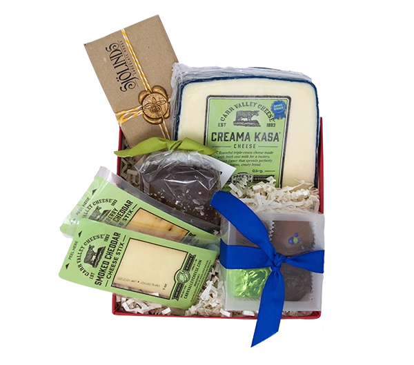 Step beyond traditional cheese pairings, like sausage and nuts, and step into this perfect mini box of Wisconsin cheese and chocolate. Yes, chocolate. A delightful, unexpected gift for clients, teachers, a party host or a friend in need of some love.
