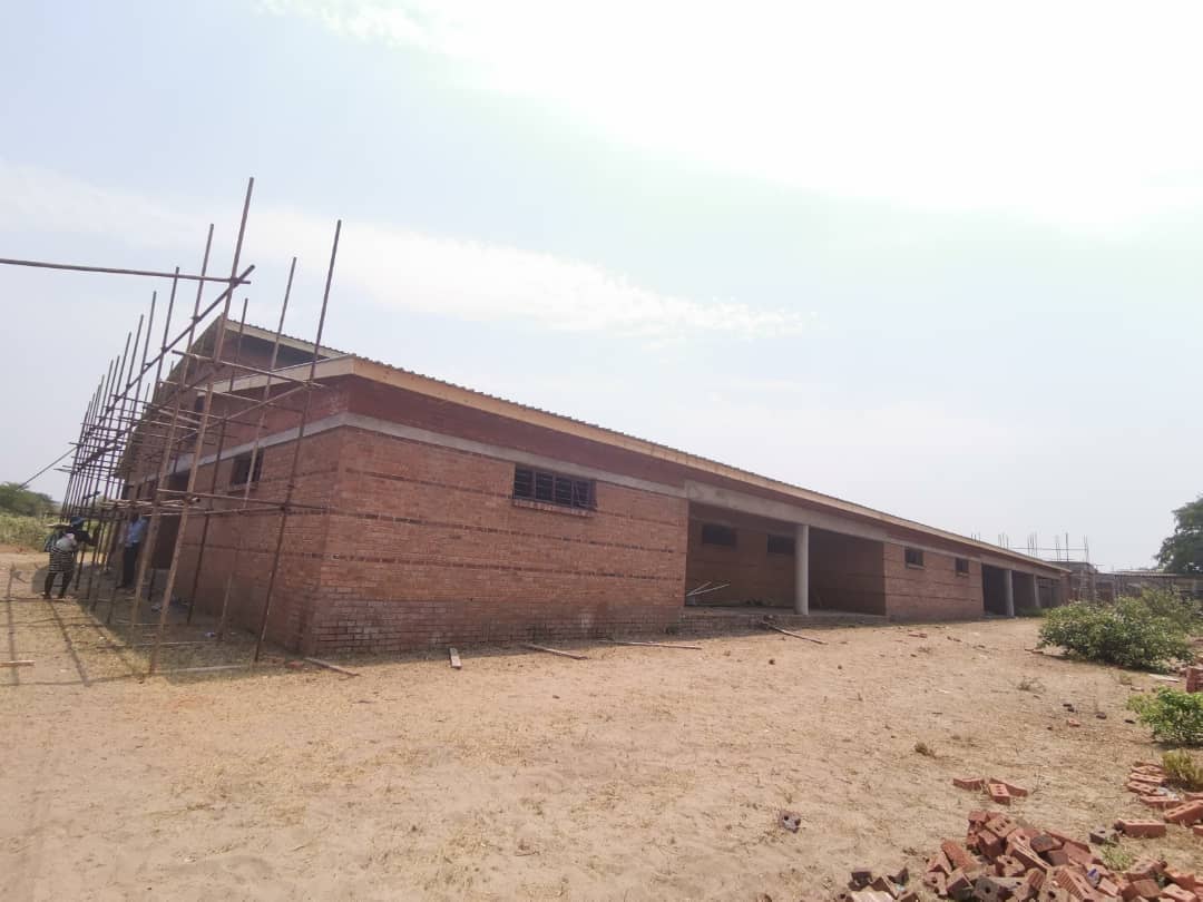 InfoMinZW's tweet photo. Lupane Provincial Hospital is now at roofing stage. It is one of the key projects in Matabeleland North which the Second Republic has earmarked to complete in 2022 #Vision2030 #Devolution #ZimSanctionMustGo https://t.co/gBG2nu7fKy