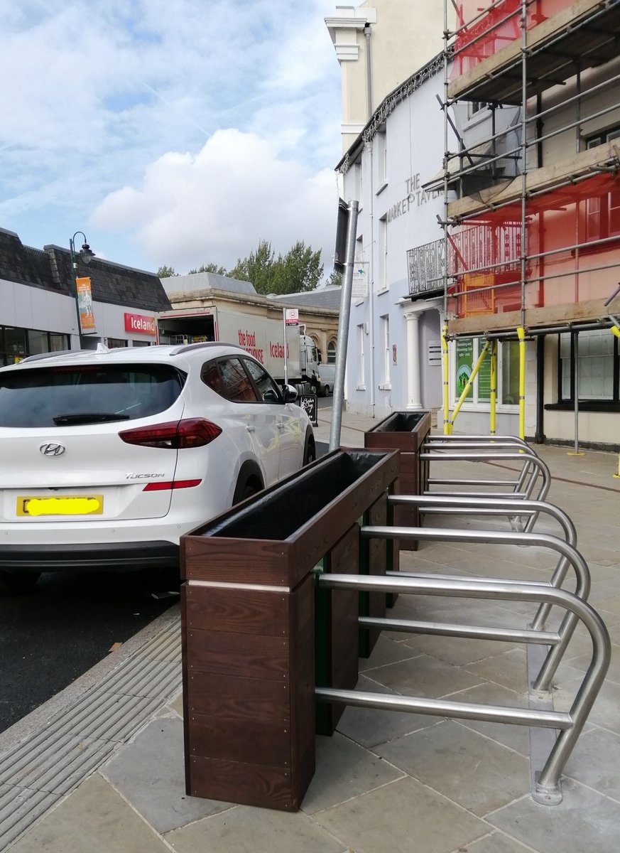 These new cycle/scooter racks in #monmouth look fabulous 
I had to have a little chuckle when the driver who left this car (half in the loading only bay and half across the footpath) moaned because they couldn't  open the door fully 🤷‍♂️ #activetravel #pavementparking   <a href="/YPLAC/">You Park Like a C***</a>