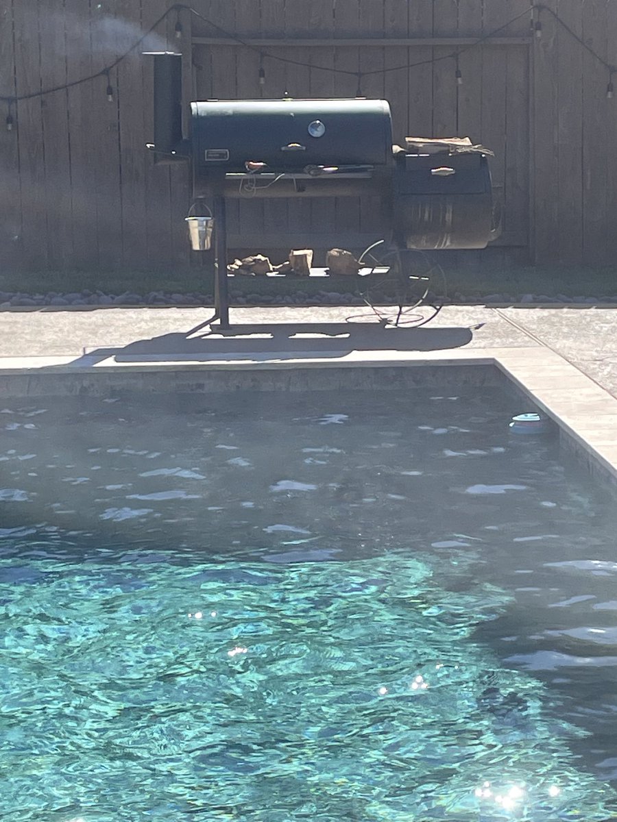 JohnValek's tweet photo. .⁦@LSUfootball⁩ win, ⁦@astros⁩ baseball coming on now and ⁦@johnnyvalek3⁩ smoking short ribs by the pool. Not a bad way to spend the day. https://t.co/p8N0DCYO05