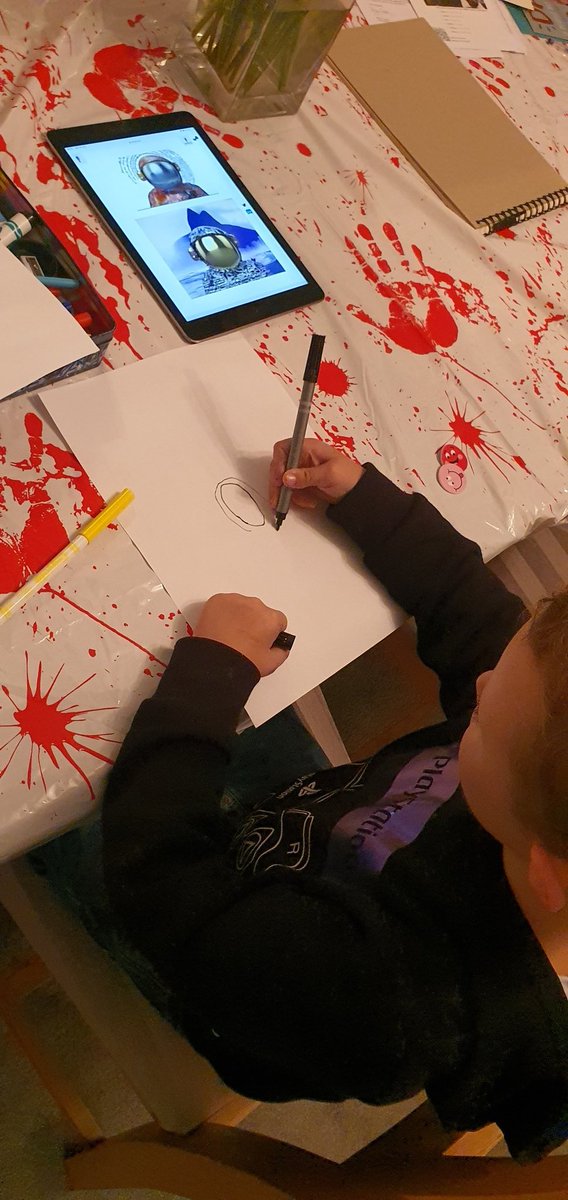 Superduper81's tweet photo. Well.... please ignore the table cloth haha we have the alphabet around his helmet with the words my planet on his body. We also have an apple tree, clouds and yellow mountains, his name is Jacob. https://t.co/3lwRepNsIq
