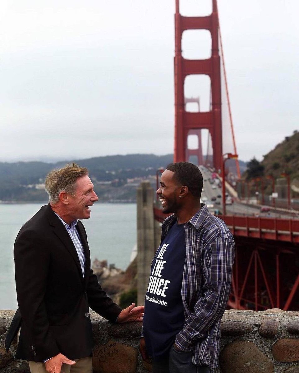 aplasticplant's tweet photo. officer kevin briggs talks kevin berthia out of committing suicide for over an hour before he finally agrees to climb back over the railing. 8 years later, the now happy father of two gives the officer an award at the american foundation of suicide. https://t.co/clWA38mNx1