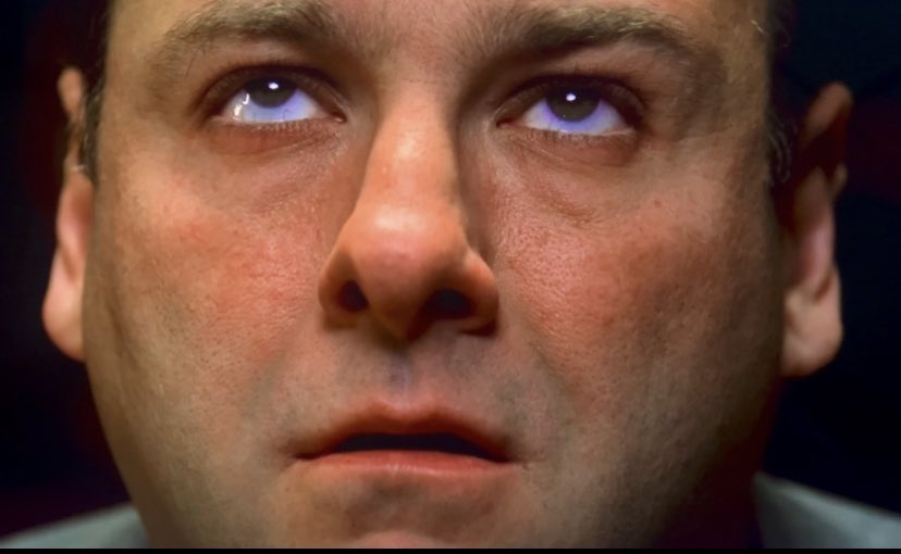 Tony Soprano is staring up at the ceiling with a slightly scared look.