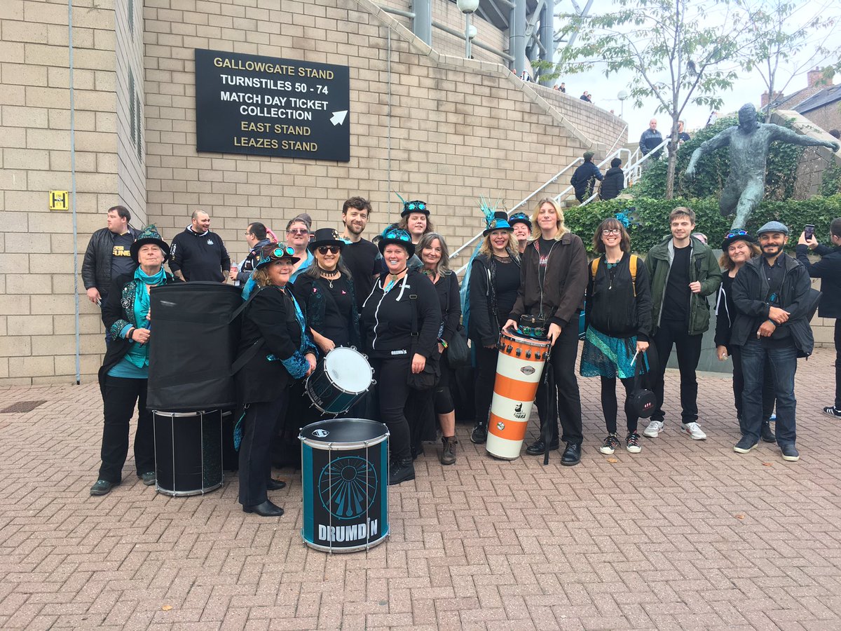 JWCRobinsonNews's tweet photo. DrumDin, a local Samba band, are also here today - they’ll be donating to the @nufcfoodbank today. Band leader Nik admits he - like many - is conflicted about the takeover, but adds he doesn’t feel #nufc fans should be the nations moral compass  #nufc #NEWTOT https://t.co/8qKzq9IgJO