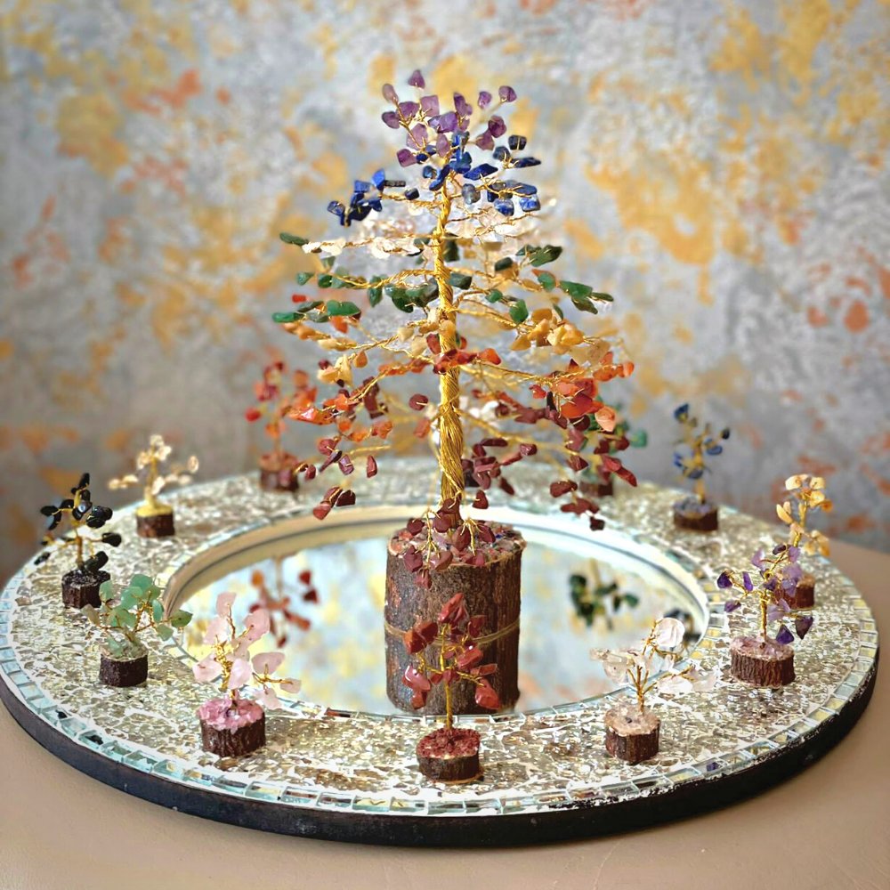BellaMiraHome's tweet image. One of our lovely customers sent this photo in - what a gorgeous arrangements of the Petite Crystal Trees around the Large 7-Chakra Tree! Thanks @simona_i_am_you 🧡💕   
#treeoflife #treesymbolism #chakrahealing #chakracrystals #crystallove #crystalshop  #ealingshopping