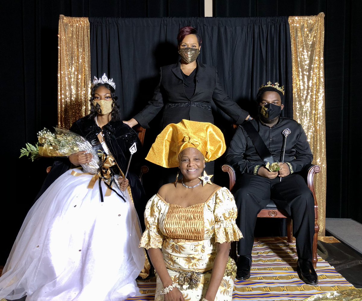 apsDouglassHigh's tweet photo. Our 2021 Homecoming Royal Court looked stunning during today’s Coronation Ceremony! #WakandaForever 💛🖤🌟🖤💛@forrest_taylor1 @Retha_Woolfolk @kristenyoderAPS @apsupdate https://t.co/clRkvqIRkr