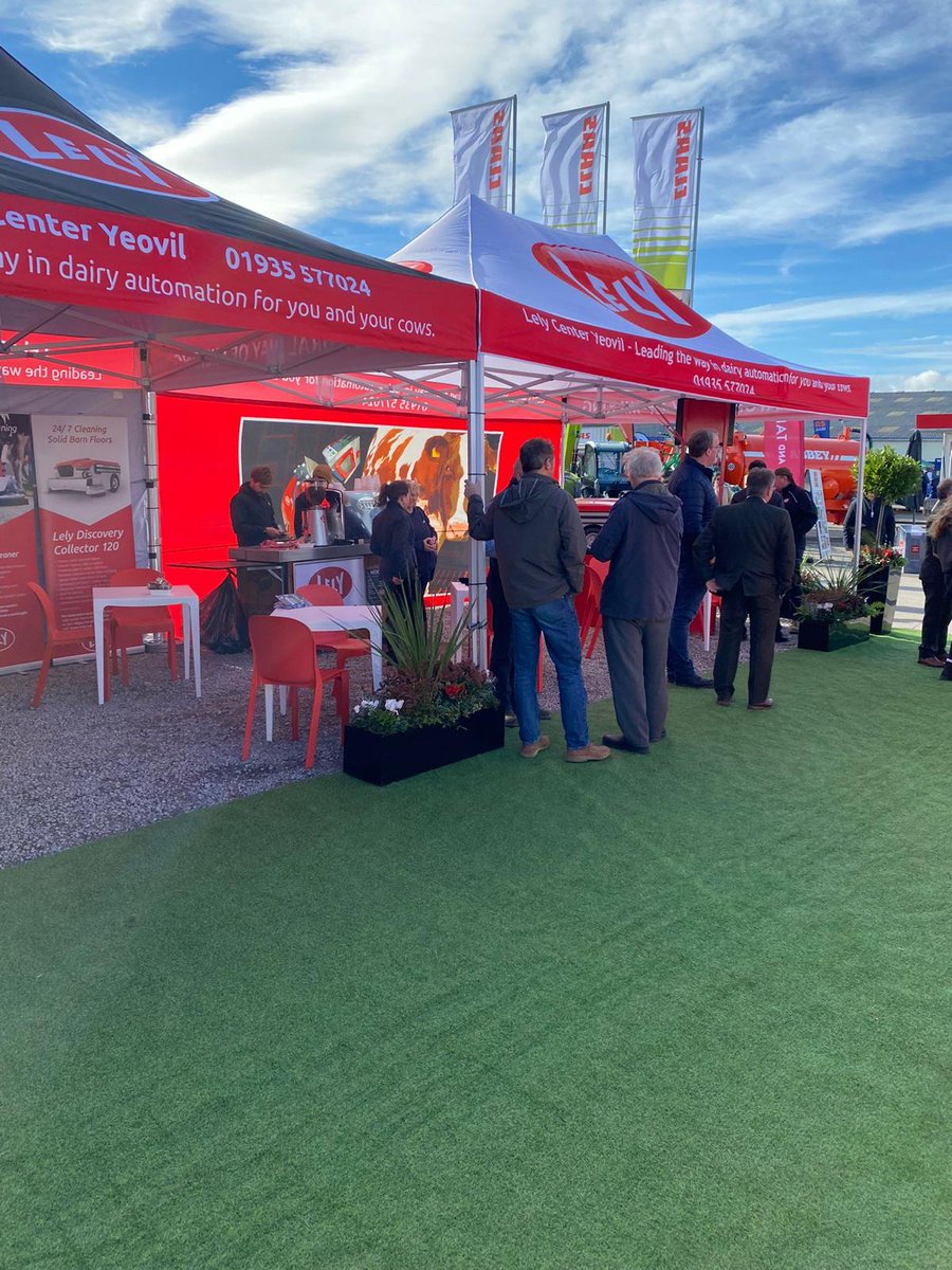 LelyAtlantic's tweet photo. Great to see so many people visiting Lely Center Yeovil's stand at the Dairy Show today. They team have Lely Juno and Astronaut robots ready to show you! #DS21 @BathandWest #teamdairy #farmrobots https://t.co/kMfYEGi0lU