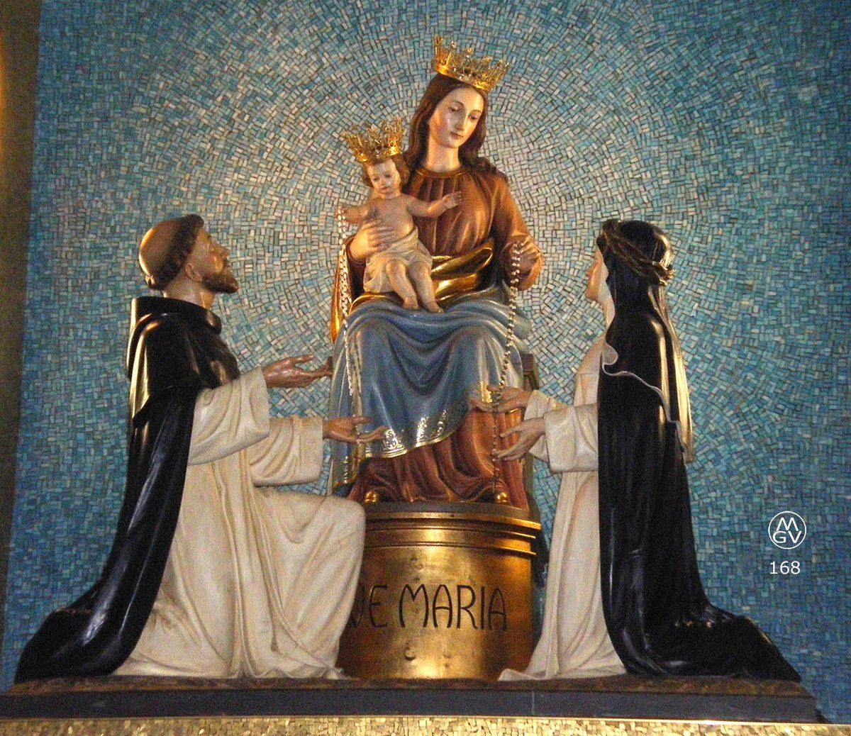 GMussner's tweet photo. This statue of Our Lady of the Rosary was carved in our studio for a parish in southern Italy. The statuary group has in addition a beautiful mosaic background.
https://t.co/jms89Fdp8e
#ourladyoftherosary #olrosary #statuary #Mussner #artstudio https://t.co/2Spe4HoGxF