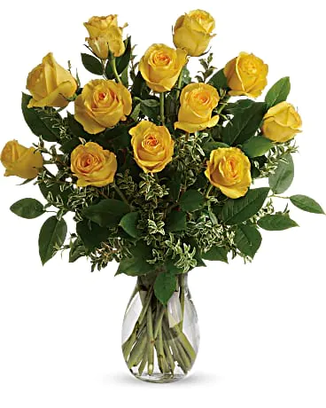 Say Yellow Bouquet

Here comes the sun! Say hello to a happy day with this grand bouquet of a dozen yellow roses and fresh greens in a graceful glass vase.