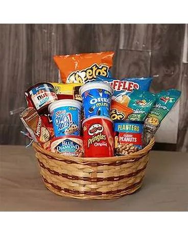 No one can resist selection of DELICIOUS SNACKS! An assortment of sweet and savory snacks delivered in a wicker basket, perfect for any occasion!