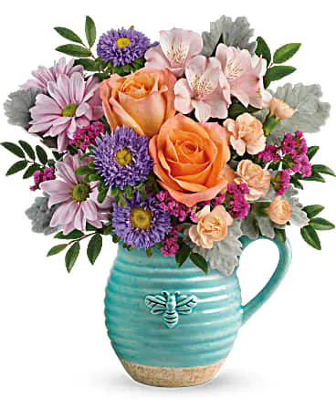 Teleflora's Busy Bee Pitcher Bouquet

Talk about buzz-worthy! Presented in a country-inspired and fabulously food-safe ceramic pitcher with petite bee motif, this cheerful bouquet of lush orange roses and pretty pink blooms is two gifts in one!