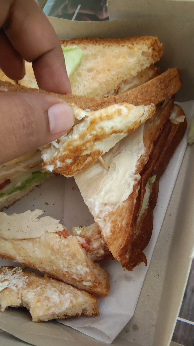 pragyawangrd's tweet photo. @zomato  I ordered club sandwich which shows green filter representing veg but what I received is non veg sandwich with egg and chicken. I ate a bite of it and then realised the mess as I am allergic to it. Is this a joke to you guys? https://t.co/rgfOWQZrbw