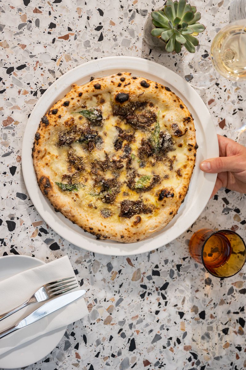 Guess who's back?! That's, right! It's the return of our mouth-watering ox cheek and red wine ragu pizza! 🍕 This cheesy goodness has a bechamel base and is served with the finest cuts of ox cheek that's been cooked in a delicious red wine ragu topped with aged parmesan and basil