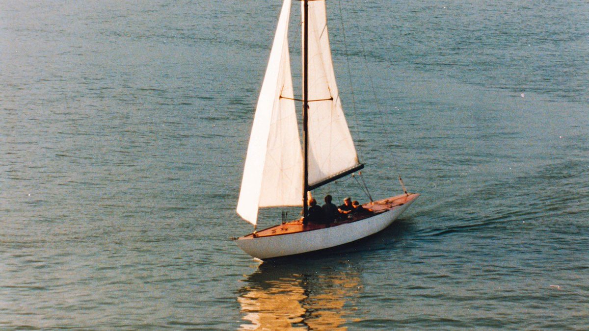 Meet <a href="/kyria6mr/">Kyria Six Metre</a>! Currently undergoing a painstaking restoration, the 1947 #SixMetre has been owned by the same family for decades. 

We love this 1982 pic; the 10 yr old boy sitting with his granddad at the helm is now her owner. Give him a follow to keep up with progress!