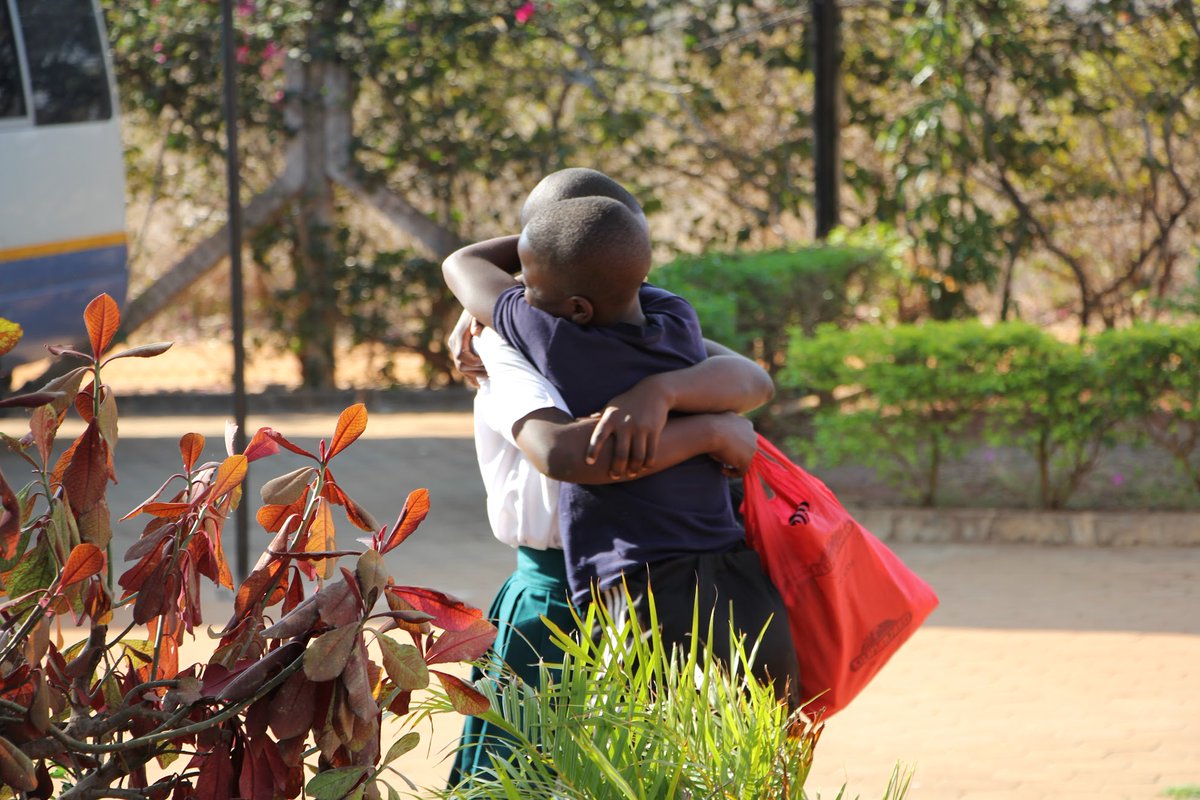 NurturingMinds's tweet photo. Happy faces as the girls reunite with their school mates after a short midterm break. SEGA also welcomed new Preform 1 class who started the English fluency program in preparation for official beginning of Form 1 curriculum in January. #SEGAGirlsSchool #GirlsEducation #Tanzania https://t.co/WxghAvWecy