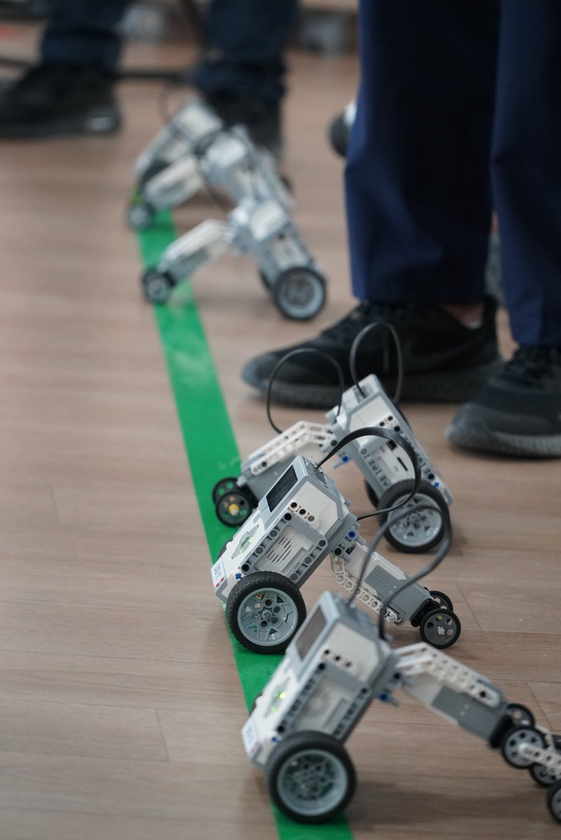 AIS_DigitalEd's tweet photo. Our #AISGrade8 students raced their robots to see which one crosses the green line first. #AISDigitech #AISJrSecondary https://t.co/N2SmG1JdQw