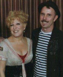 Back stage at the Leonard Cohen concert I ran into Bette Midler.She asked if I would like to go to her show and would I sign a copy of my book "Snake Oil" for her daughter. I said hell yeah. Her P.A handed me 2 tickets. She said "bring the book and give to me after the show".