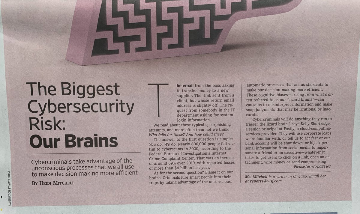 A photograph of the article “the Biggest Cybersecurity Risk: Our Brains” in the WSJ